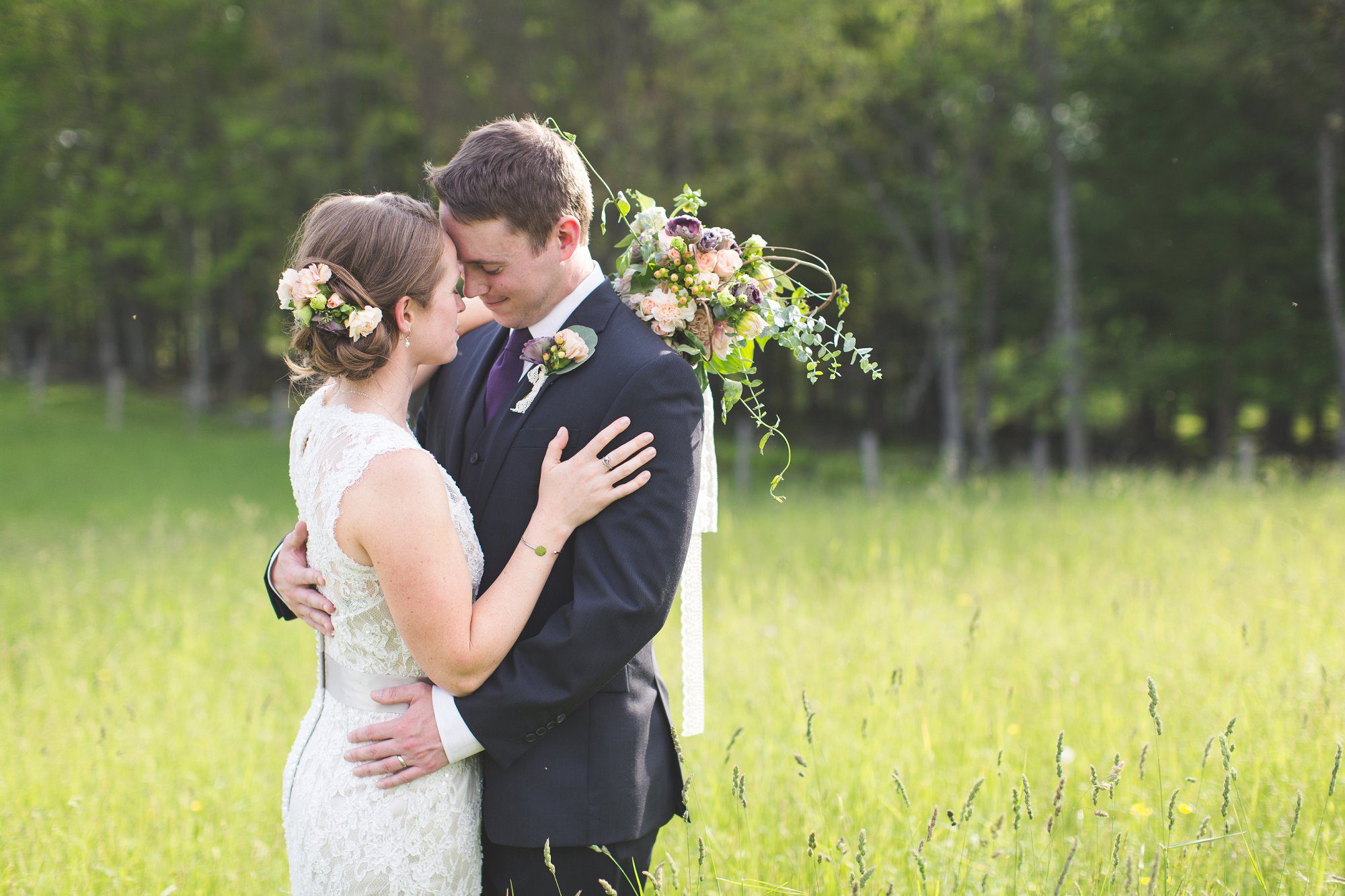 Wedding Photos in a grassy field in the White Mountains of NH