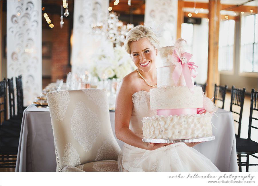 Bride at La Piece holding wedding cake by Ooo La La Cakes
