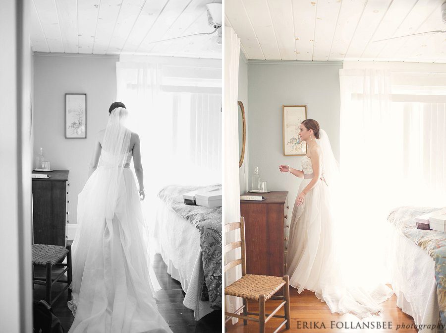 bride looking at herself in the mirror of a sunlight filled bedroom