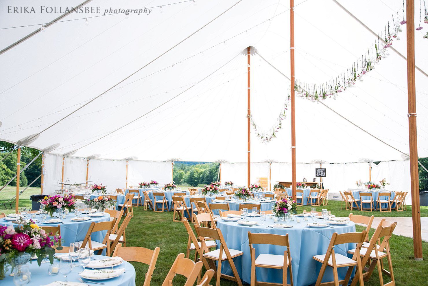 Tented wedding reception with powder blue tablecloths | Special Events of New England